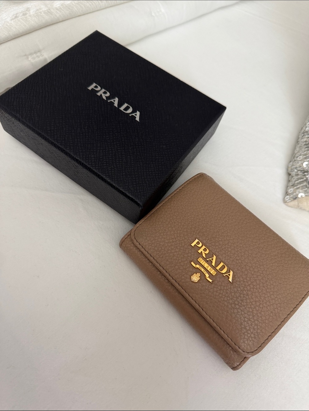 Prada Pebbled Leather Compact Wallet in Taupe with Gold Logo